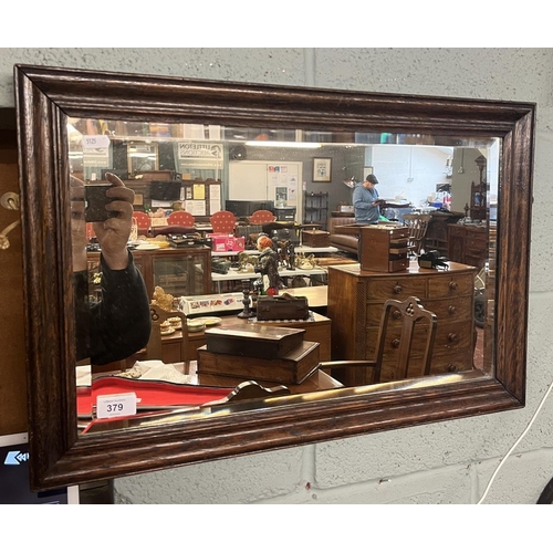 379 - Bevelled oak framed mirror - Approx 41cm x 61cm