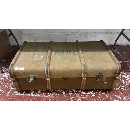 413 - Antique trunk and contents