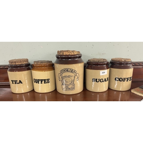 454 - Salt glazed storage jars with cork tops