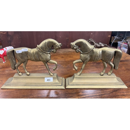 493 - Pair of brass flat back horses 