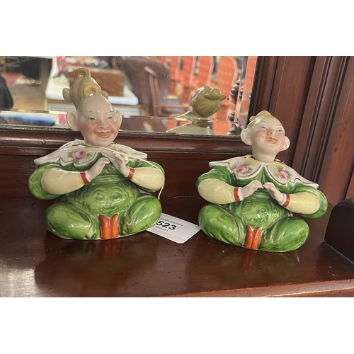523 - 2 ceramic nodding Oriental figures