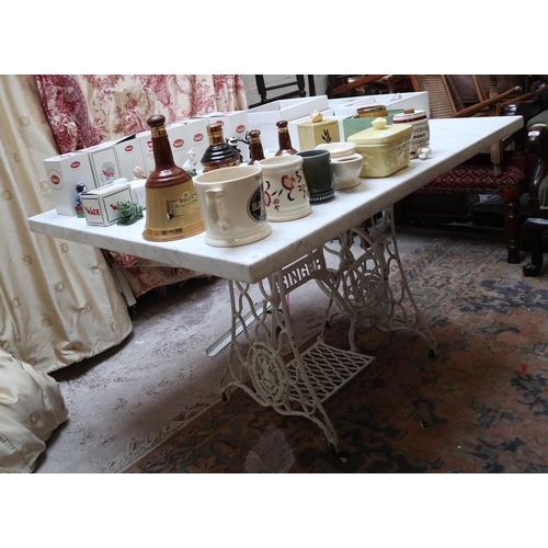 543 - Singer sewing machine base converted to table with marble top