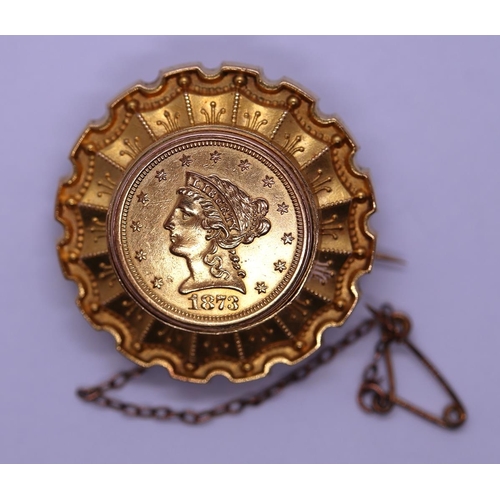 72 - Gold mourning brooch set with a 22ct $2.5 coin dated 1873 - Gross weight 12.2g