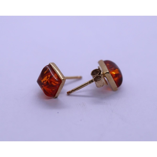 81 - Pair of 9ct gold amber set earrings