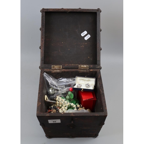 88 - Collection of costume jewellery to include silver in a wooden box