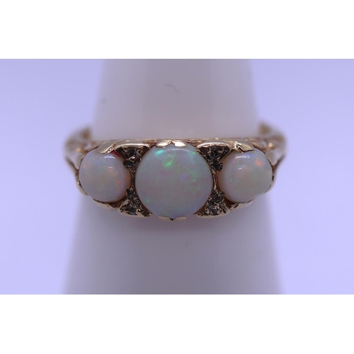 27 - 9ct gold opal & diamond set ring - Size I