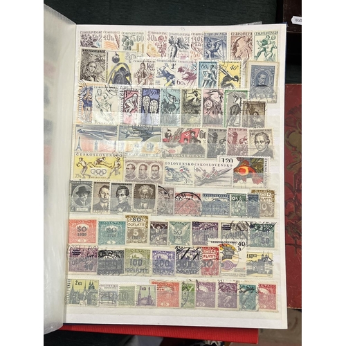 270 - 3 well populated stamp albums together with some loose