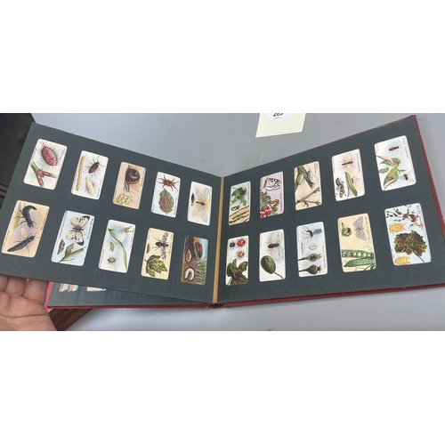 289 - 7 well populated Wills cigarette albums