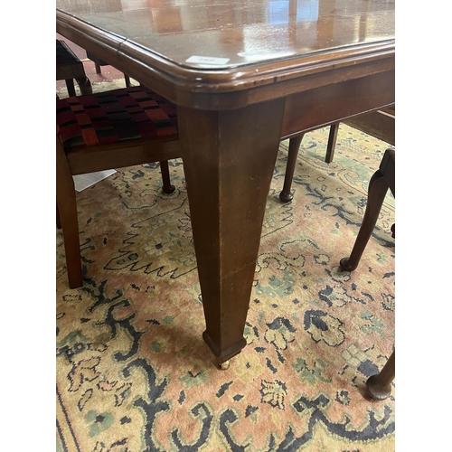 389 - Mahogany wind out dining room table together with 6 chairs and a carver marked Piggott - Approx size... 