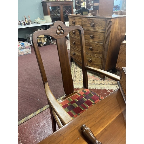 389 - Mahogany wind out dining room table together with 6 chairs and a carver marked Piggott - Approx size... 