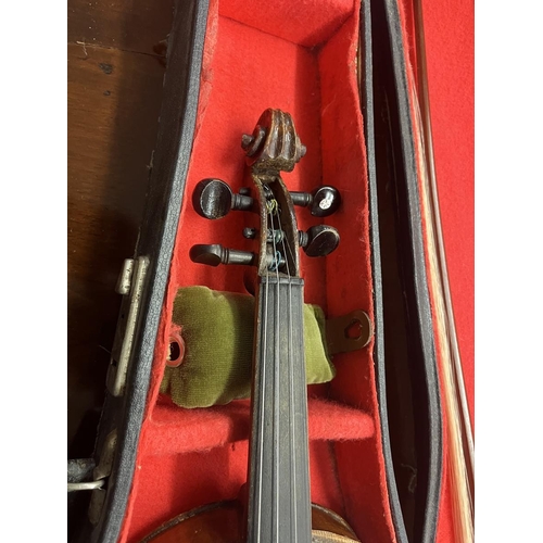 391 - Cased violin