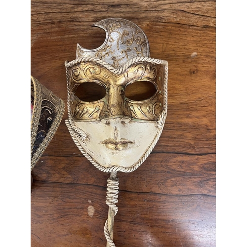 497 - 2 hand painted Venetian carnival masks