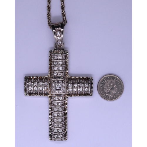 66 - Large silver stone set cross on silver chain