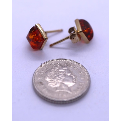 81 - Pair of 9ct gold amber set earrings