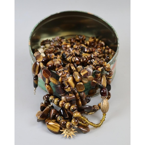 87 - Large collection of tiger eye jewellery