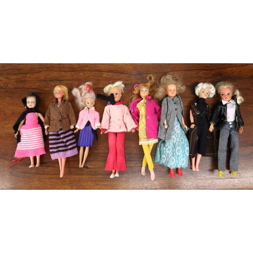 448 - Large collection of vintage Sindy, Barbie clothes, furniture, pram etc