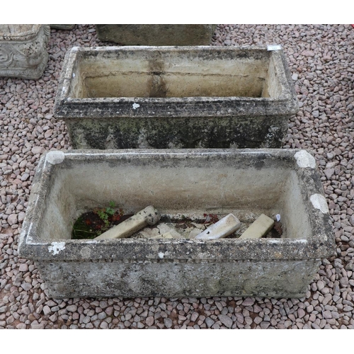 151 - Pair of large planter troughs with feet