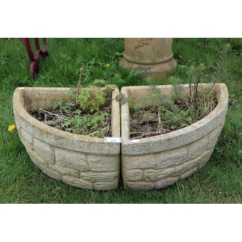 173 - Pair of stone corner planters