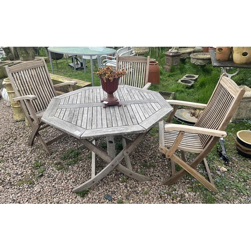 218 - Octagonal teak garden table with 3 chairs