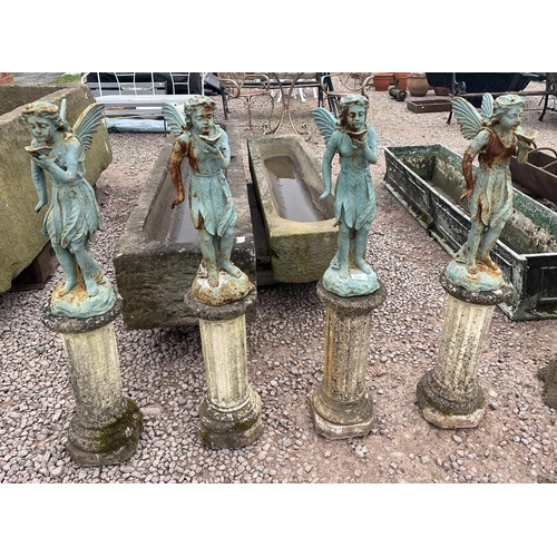 247 - 4 cast iron fairies on stone bases - Approx height: 102cm