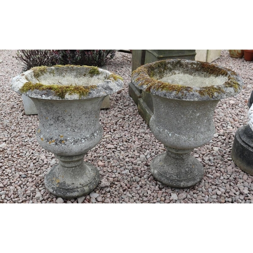 30 - Pair of stone pedestal planters