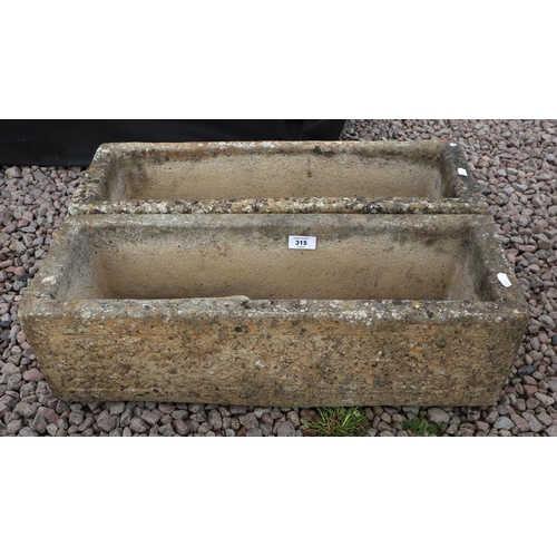 315 - Pair of stone trough planters with feet