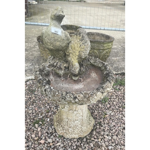 361 - Stone birdbath adorned with ducks