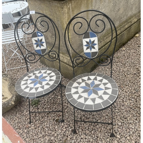 423 - Pair of folding mosaic garden chairs