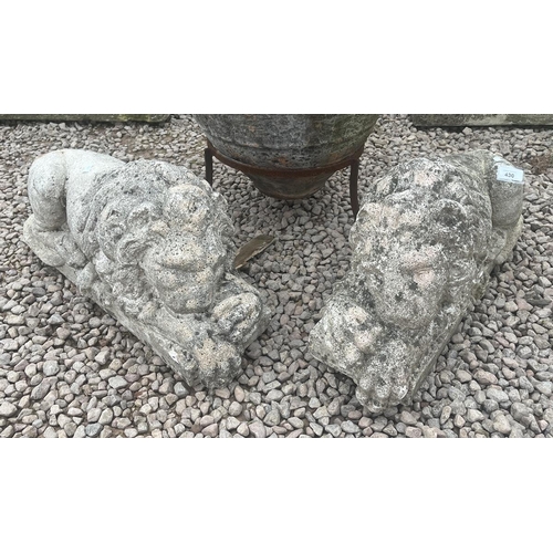 430 - Pair of stone reclining lions