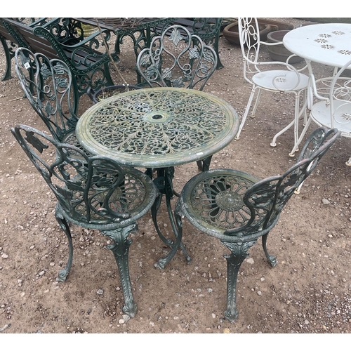 443 - Metal garden table with 4 chairs