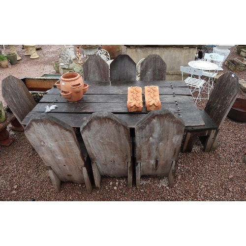 461 - Large and heavy oak table with 8 chairs