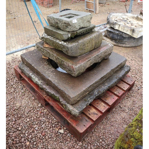 490 - Collection of stone well tops etc.