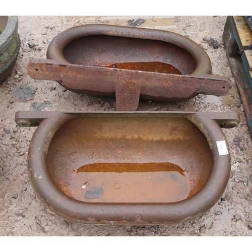 494 - Pair of heavy wall mounted cast iron troughs