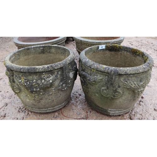 496 - Pair of stone circular planters