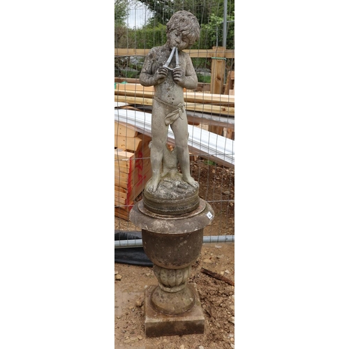 560 - Flute playing stone boy figure on base - Approx height: 135cm