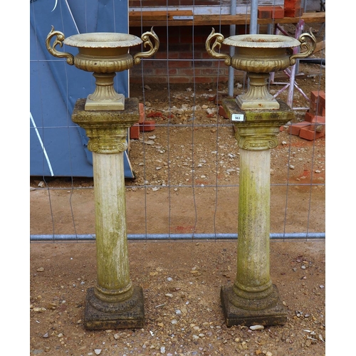 563 - Small pair of cast iron pedestal planters on stone column bases - Approx height: 105cm