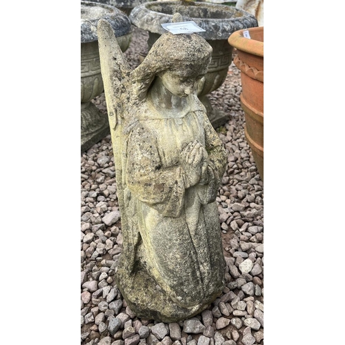 58 - Small stone angel figure