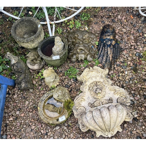 594 - Collection of stone garden ornaments