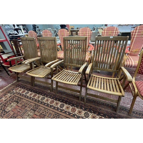 635 - Set of 4 teak garden armchairs