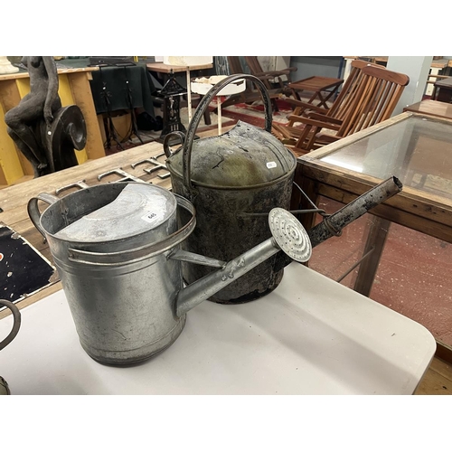 645 - 2 vintage watering cans