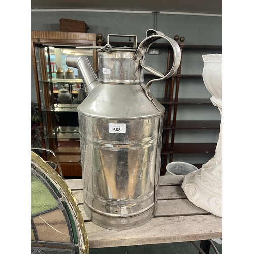 668 - Large metal water container 