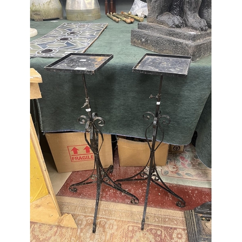 672 - Pair of wrought iron adjustable stands