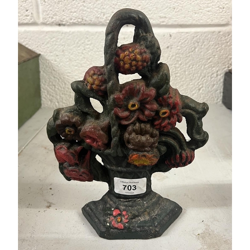 703 - Cast iron door stop in the form of a flower basket