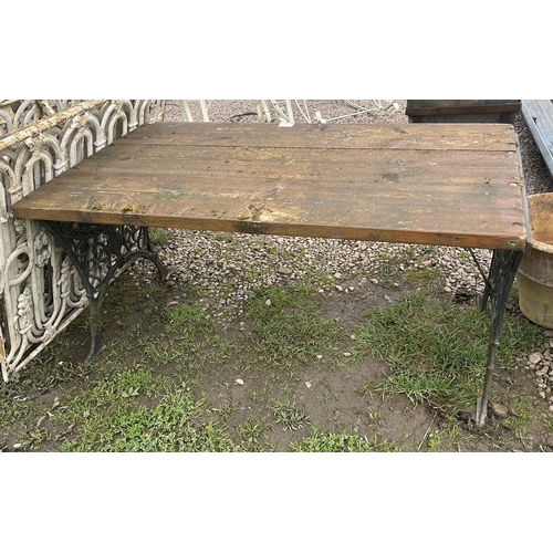 88 - Wooden table with cast iron ends