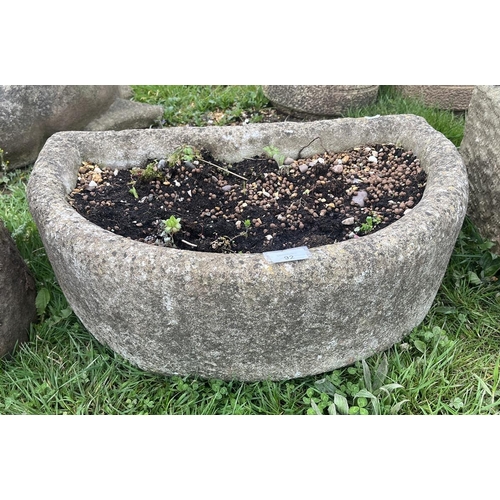 92 - Demi-lune stone trough - Approx size: W: 63cm D: 41cm H: 22cm