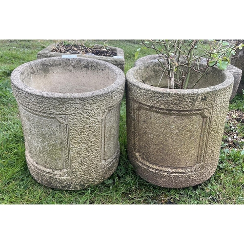 94 - Pair of circular stone planters