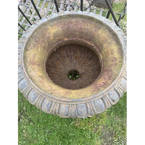 118 - Pair of cast iron pedestal planters on stone bases