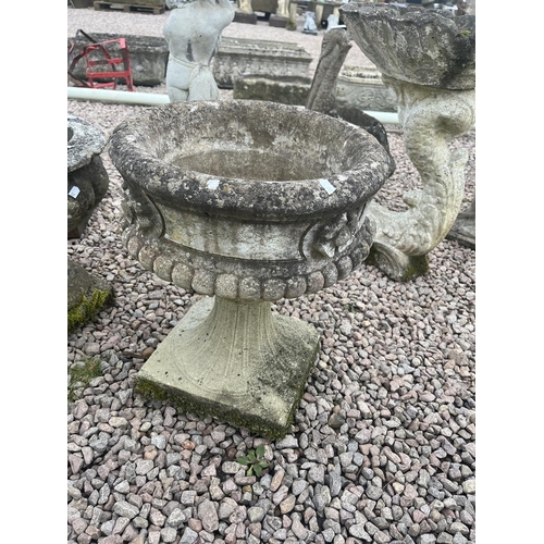 136 - 2 stone pedestal planters