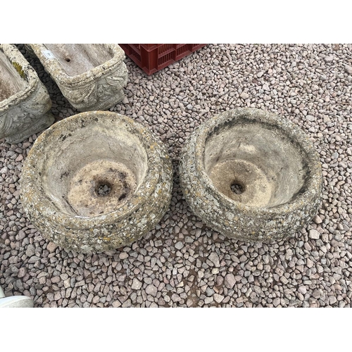 147 - Pair of low stone planters