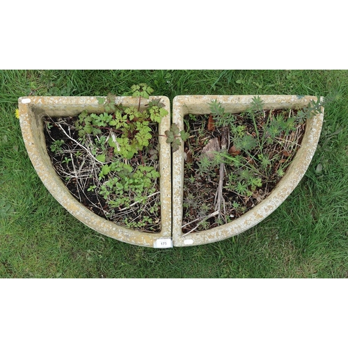 173 - Pair of stone corner planters